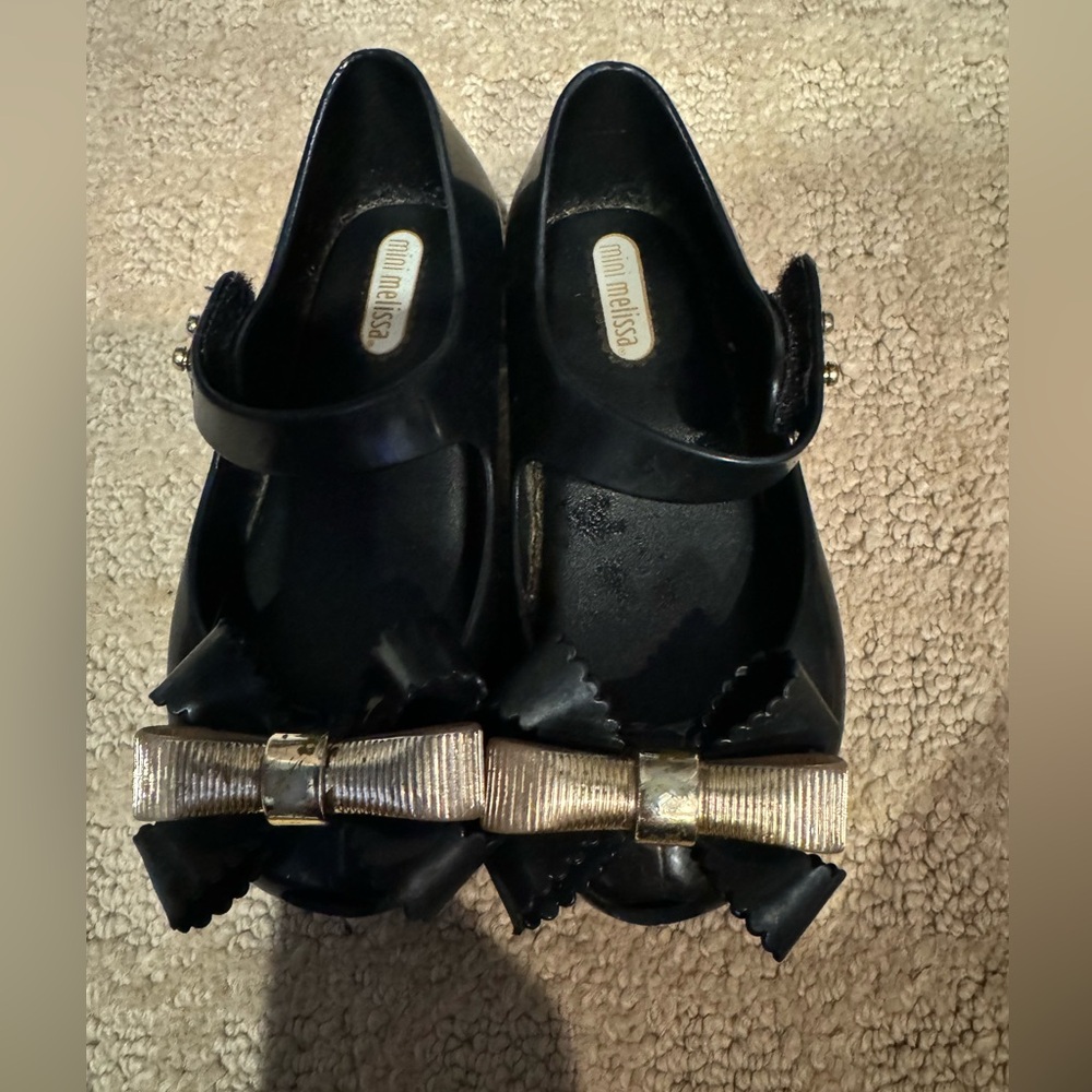 Pretty mini Melissa Mary Jane shoes with gold bow size 8